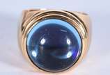 Anel de ouro 18 k com pedra azul, aro 17 (Por m... - Anel de ouro 18 k com pedra azul, aro 17 (Por motivos de segurança a peça não se encontra na loja)