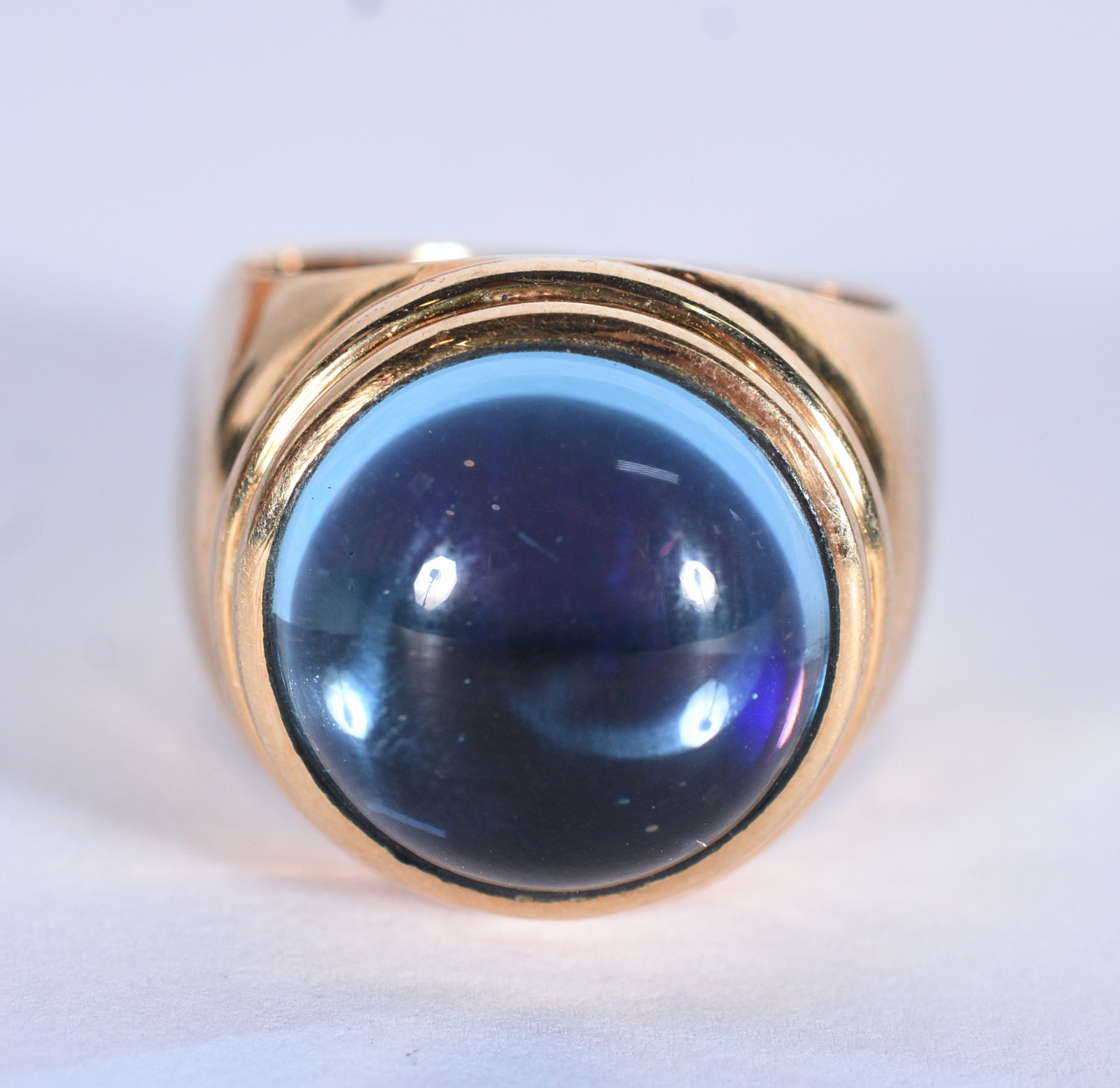 Anel de ouro 18 k com pedra azul, aro 17 (Por motivos de segurança a... - foto 1 de 6