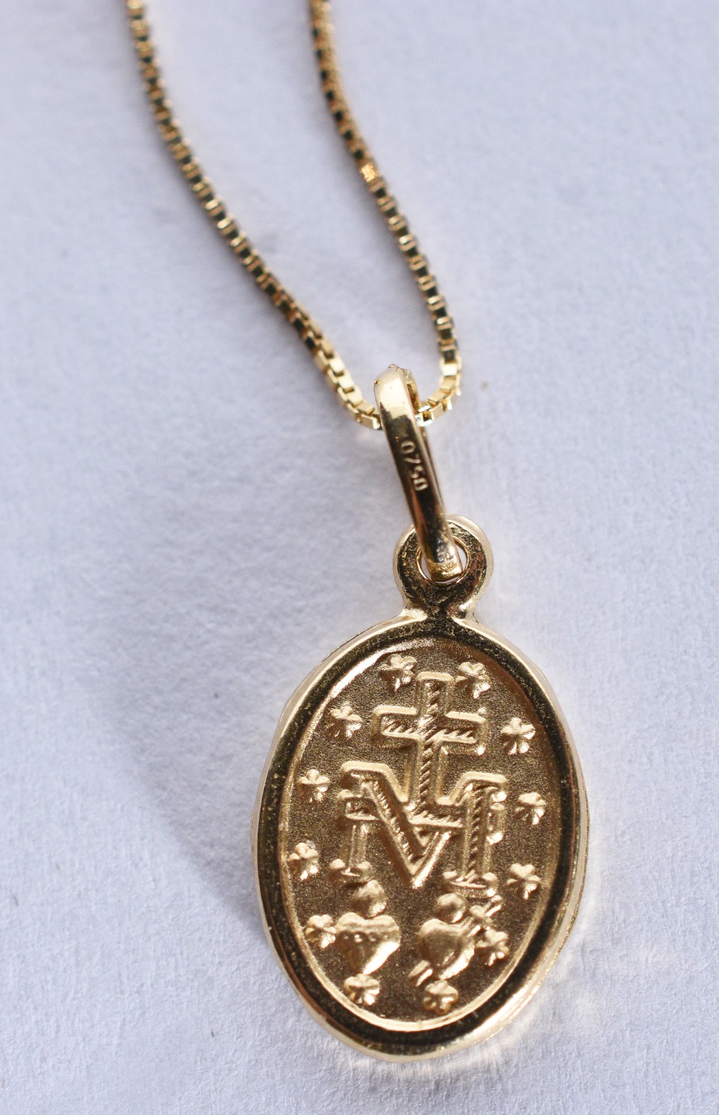 Pulseira de ouro 18 k, contraste 750 e pingente Sacro (Por motivos de... - foto 2 de 7