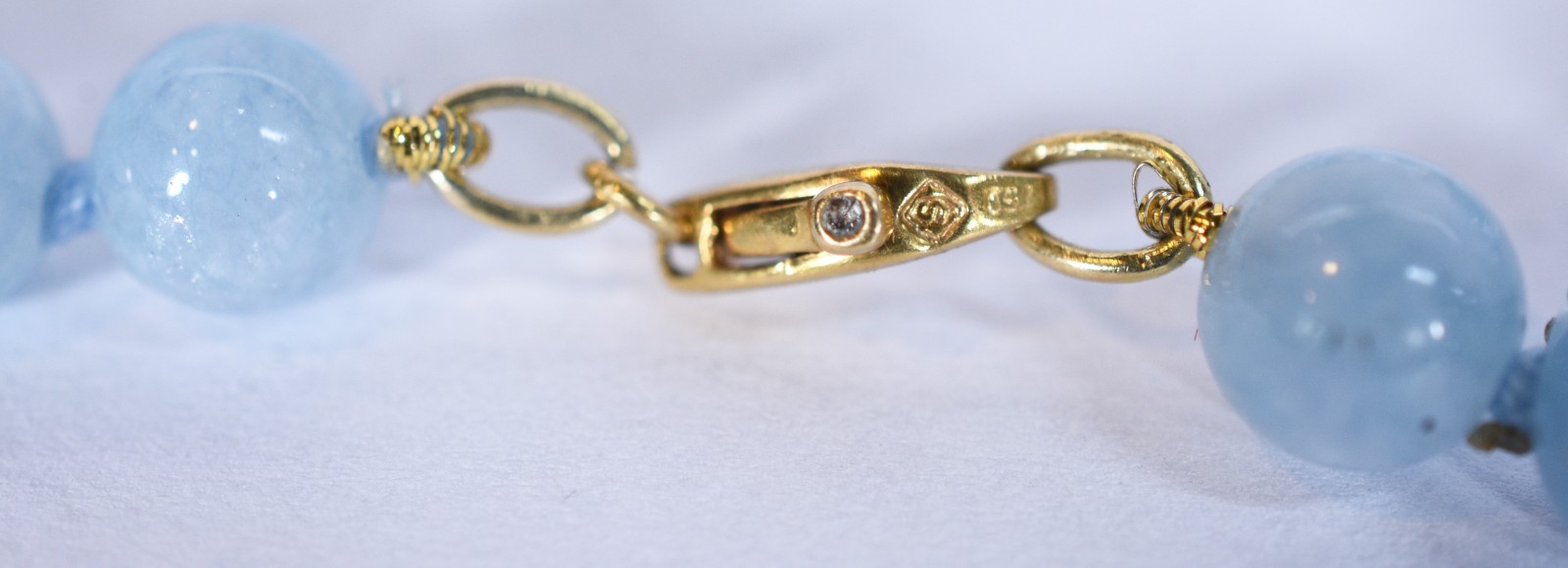 Pulseira com fecho mosquetão e argolas de ouro 18 k, contraste 750... - foto 2 de 7