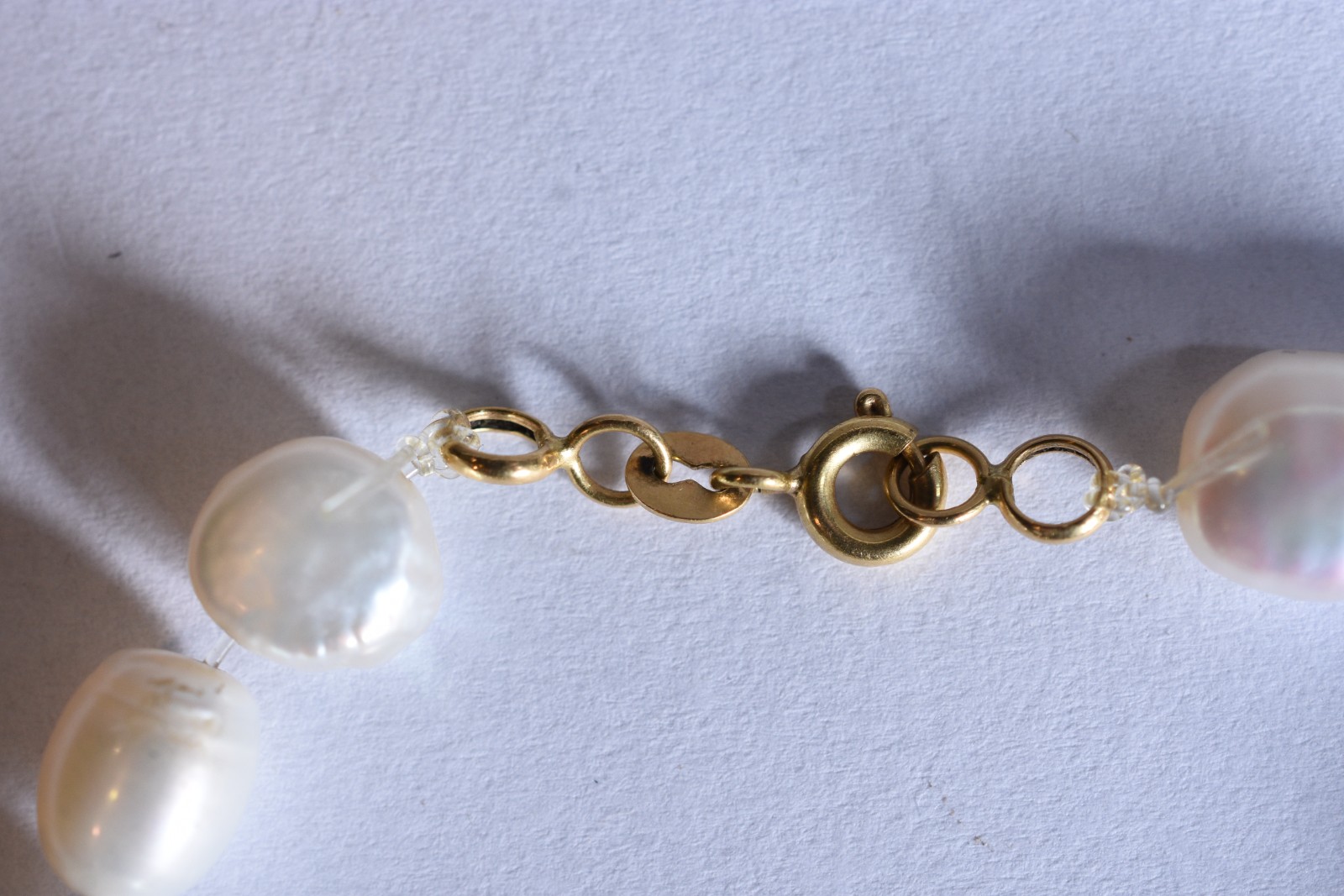 Pulseira com fecho e argolas em ouro 18 k feitio com 19 perolas... - foto 3 de 5