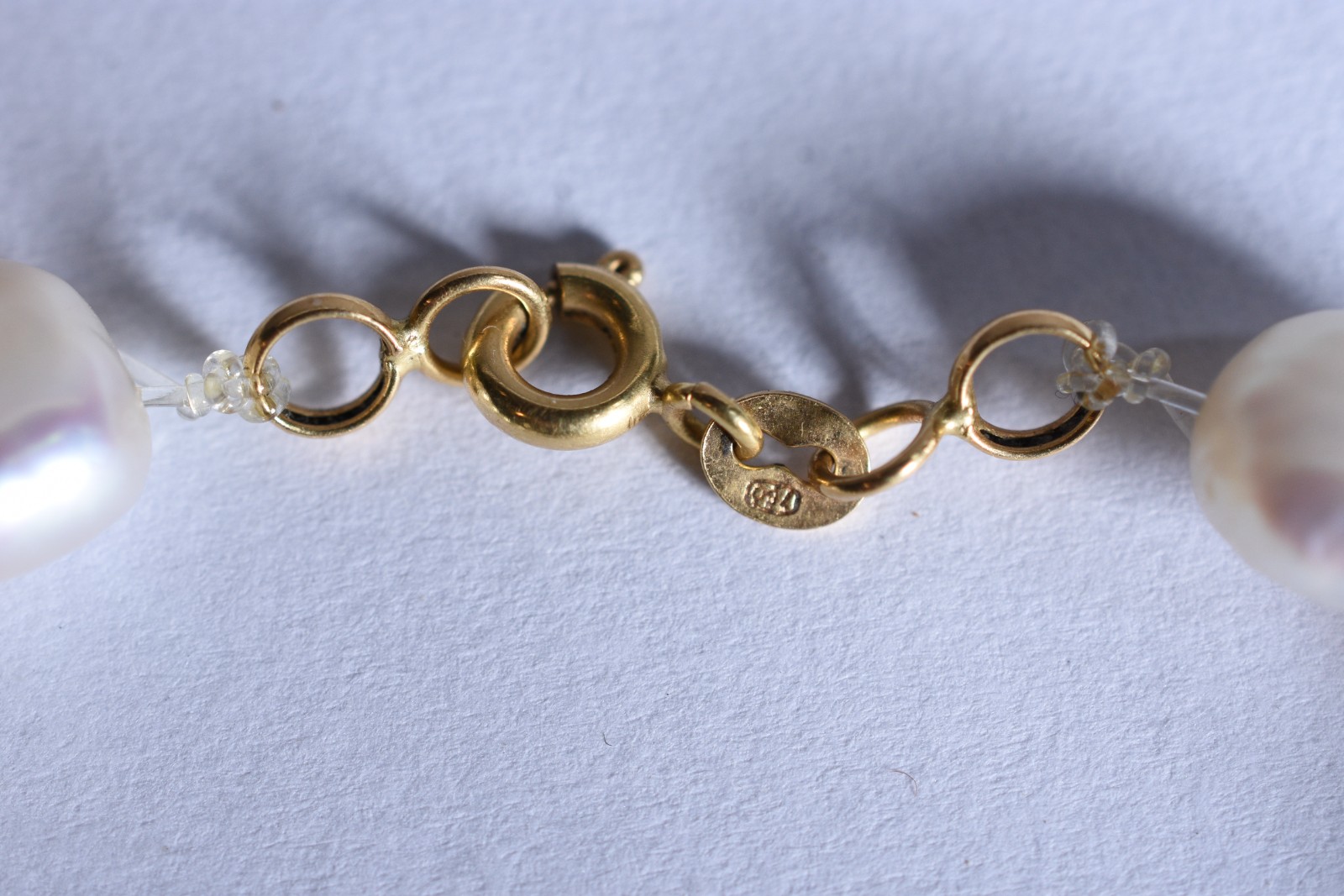 Pulseira com fecho e argolas em ouro 18 k feitio com 19 perolas... - foto 5 de 5