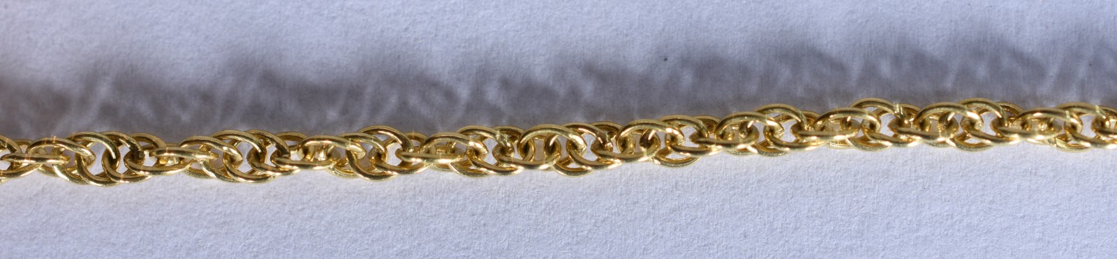 Cordão de ouro 18 k, contraste 750, feitio torcido (Por motivos de... - foto 4 de 4