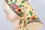 E. PATTARINO  (1885-1971),  - Busto feminino de porcelana italiana, assinada e numerada 2/6.