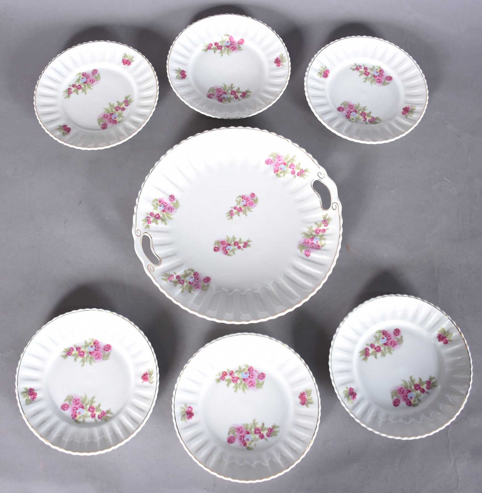 Conjunto para bolo de porcelana Real composto de: 6 pratinhos e prato... - foto 2 de 5