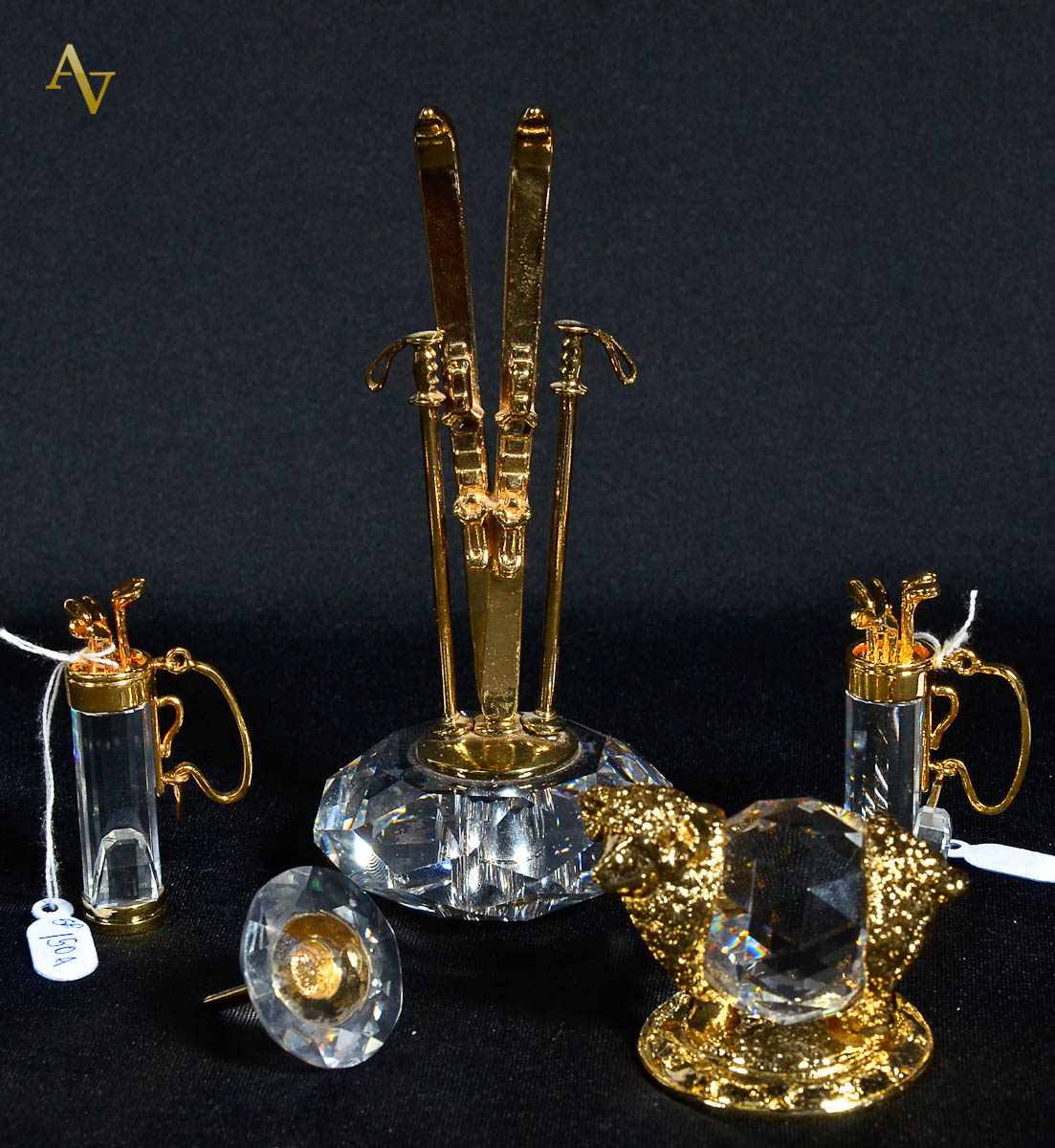 Cinco miniaturas de swarovski.