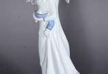 Escultura de porcelana representando dama com c... - Escultura de porcelana representando dama com criança.