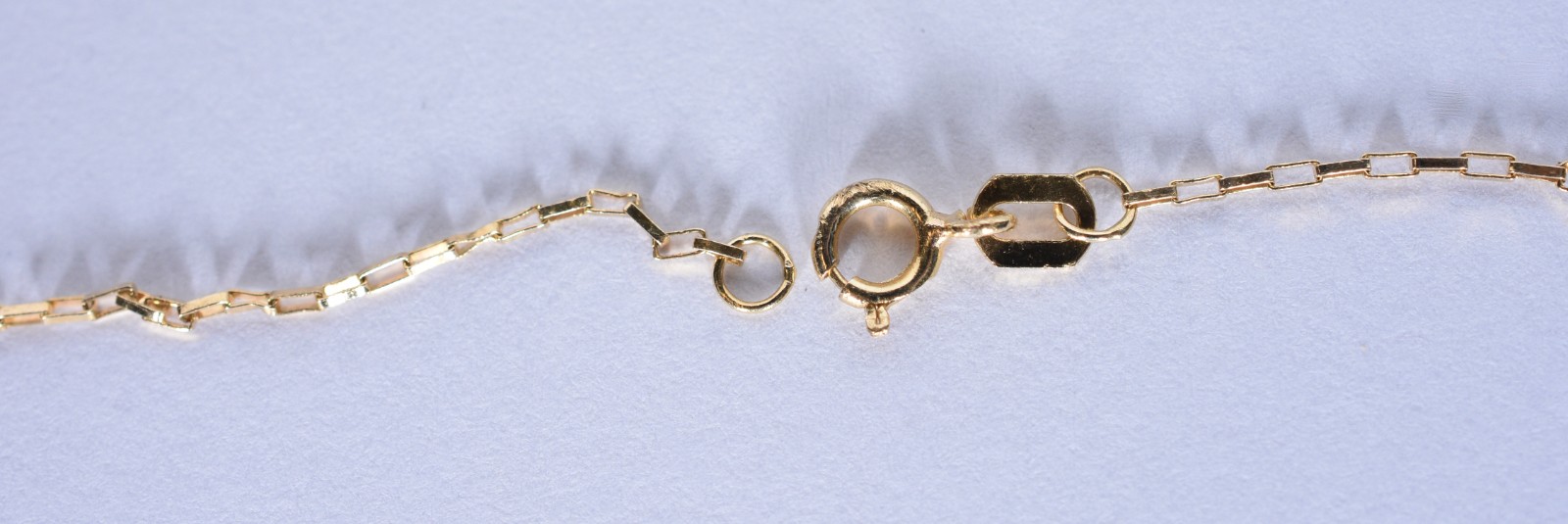 Cordão com pingente de ouro 18k. contraste 750 mls, modelo olho grego... - foto 5 de 7