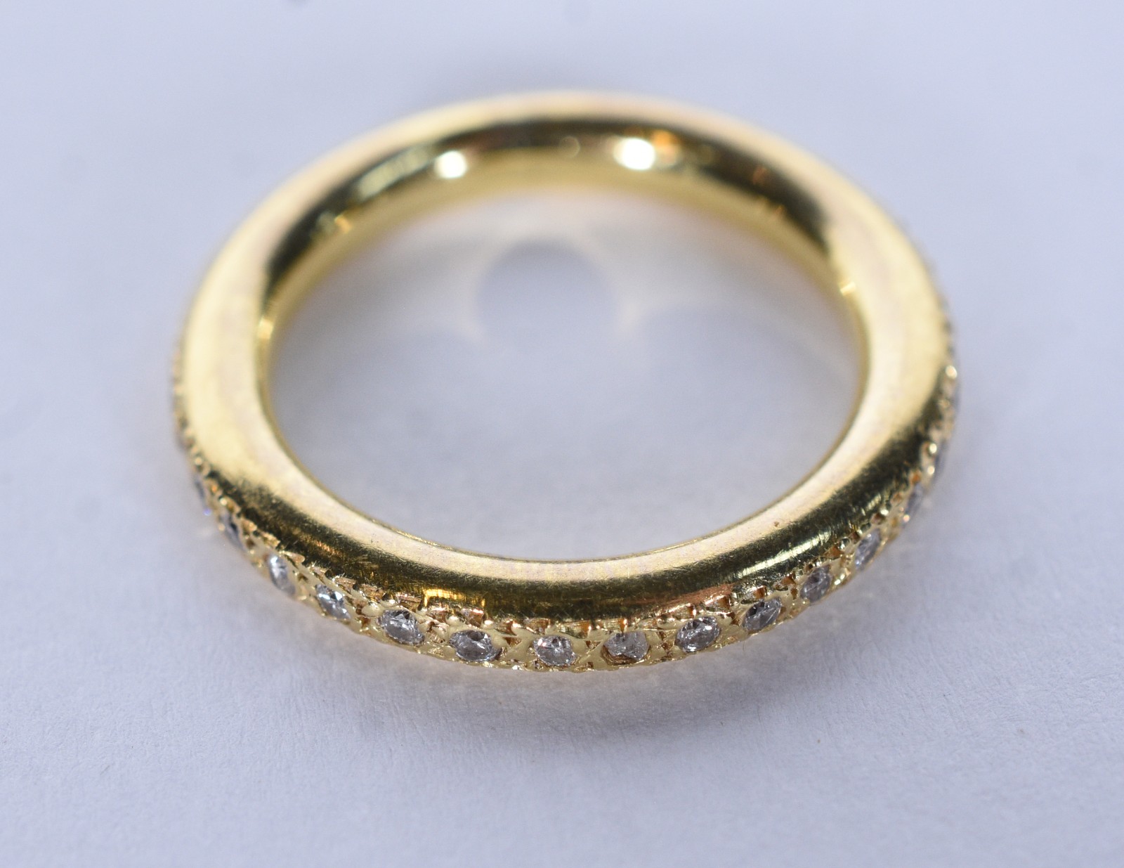 Anel de ouro 18k. contraste 750 mls cravejada em volta completa com 4... - foto 5 de 6