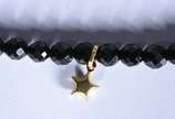 Colar com fecho, complementos e pingente de our... - Colar com fecho, complementos e pingente de ouro 18k, contraste 750 mls, fio com 67 pedras lapidadas turmalina negra e estrela. (Por motivos de ...