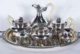 Ralaine, Paris,  - Elegante baixela francesa para chá e cafe de metal prateado, alças em marfim/osso, composto de 7 peças, sendo: 3 bules, leiteira, açucareiro, manteigu