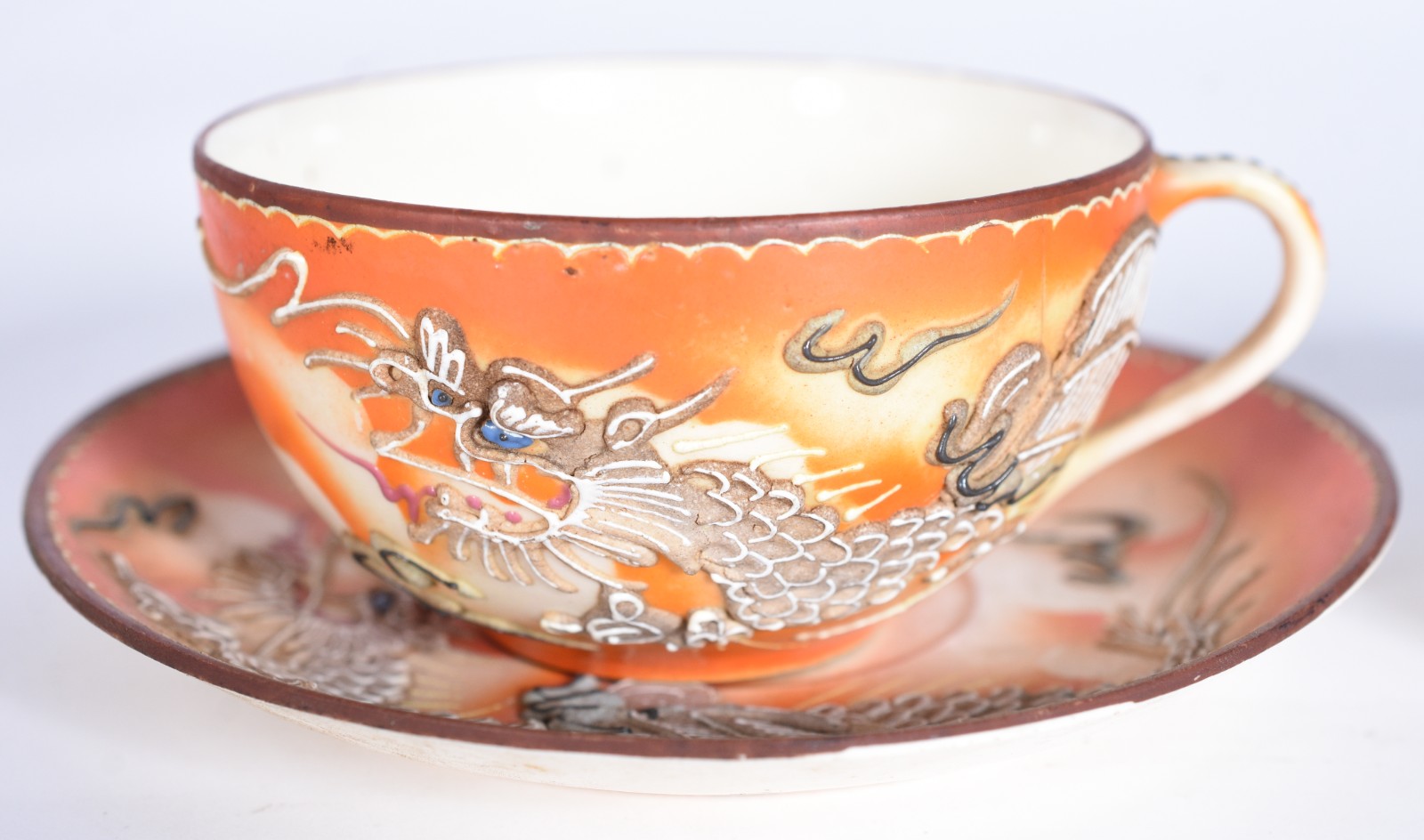 Serviço de porcelana oriental para chá e café composto de: 4 xícaras... - foto 4 de 10