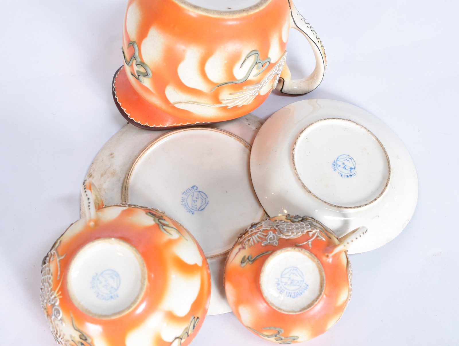 Serviço de porcelana oriental para chá e café composto de: 4 xícaras... - foto 8 de 10