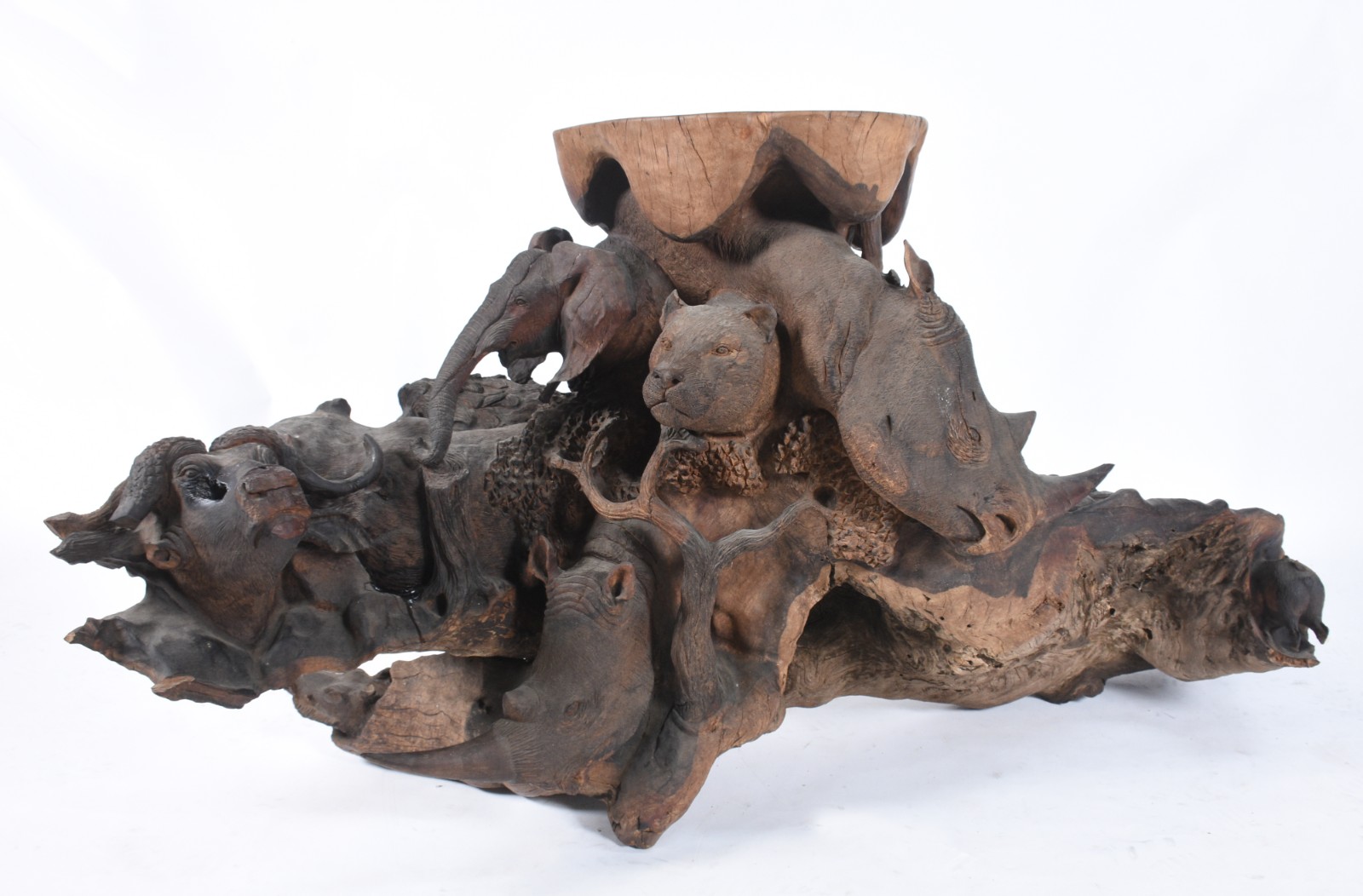 Base de mesa de madeira africana ricamente entalhada com figuras de... - foto 1 de 11