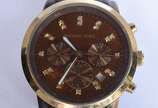 Michael Kors (1981),  - Relógio feminino, á quartz, pulseira tipo tartaruga, funcionando. No estojo. Marcas de uso.
