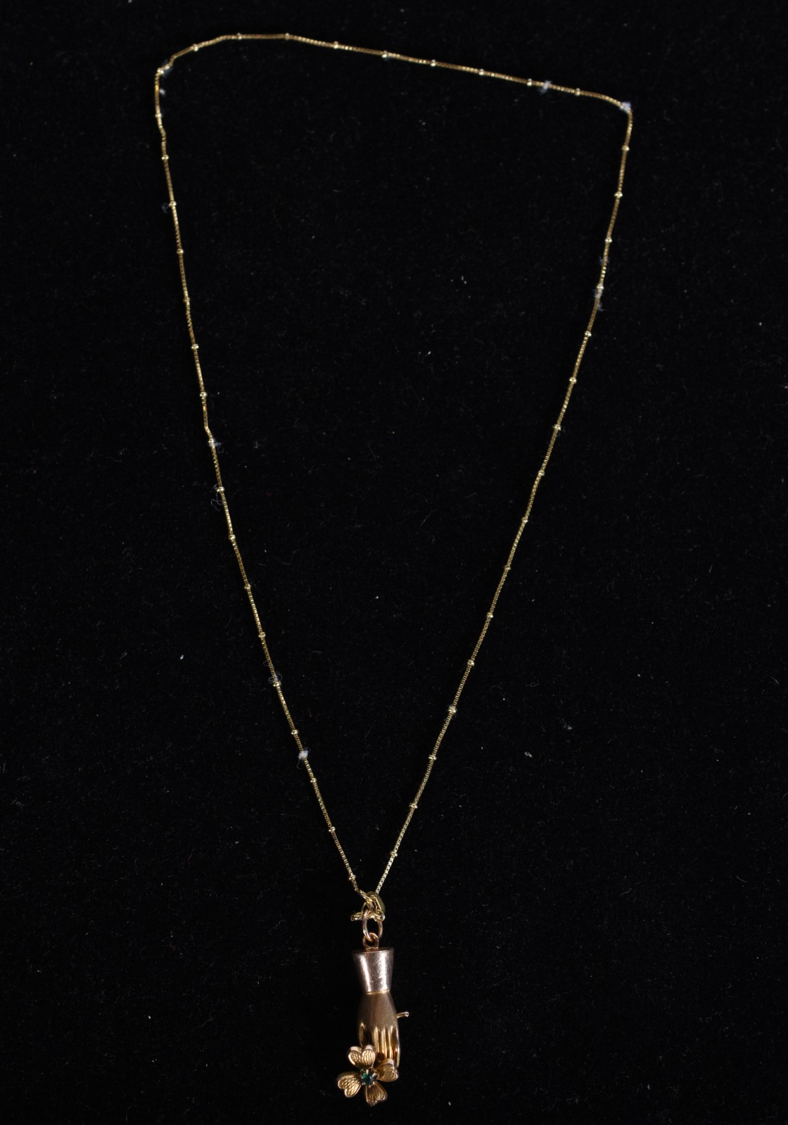 Colar de ouro 18k., contraste 750 mls com pingente de "bolinhas" no... - foto 2 de 5