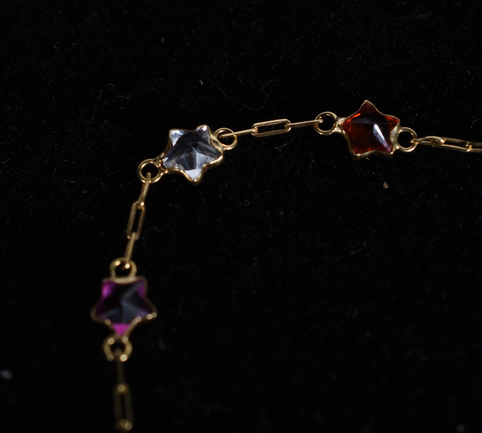 Pulseira de ouro 18k., contraste 750 mls feitio estrelinha com pedra... - foto 2 de 4
