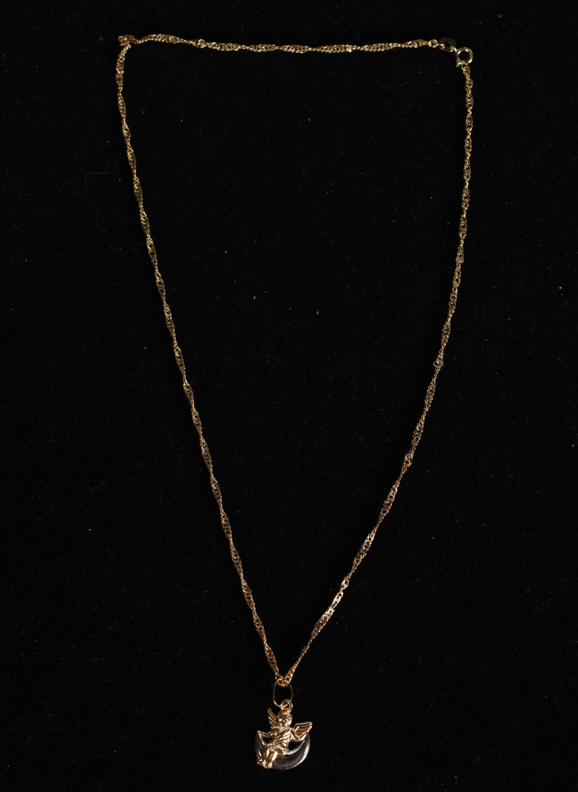 Colar de ouro 18k., contraste 750 mls, retorcido com pingente no... - foto 2 de 7