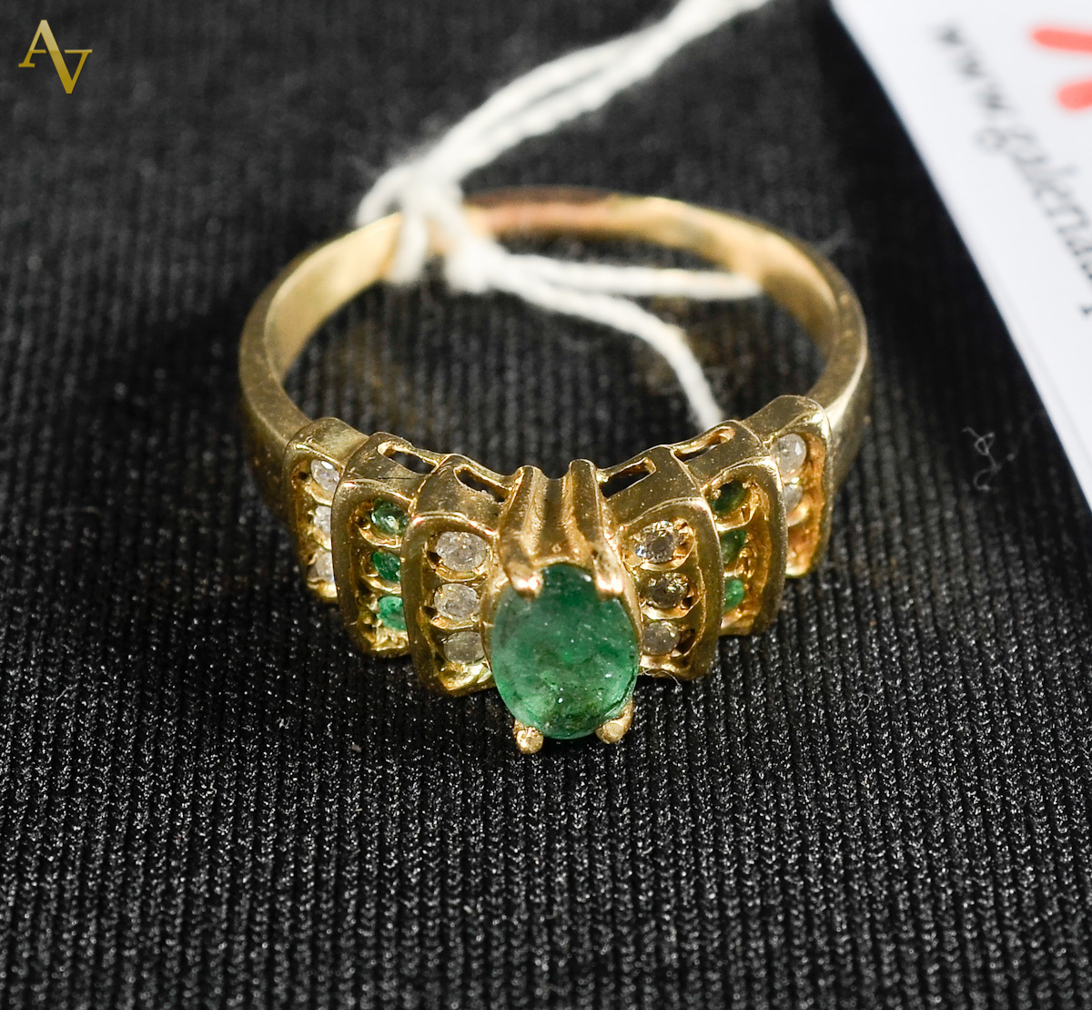 Anel de ouro 18 com esmeralda e brilhante - aro 16 - 4,2gr.