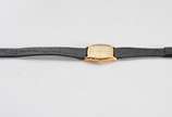 Rolex (1905),  - Relógio Rolex de pulso modelo "Cellini", caixa de ouro 18 k, fundo dourado, a corda, pulseira de couro (pulseira não é original). Marcas de uso. Funci