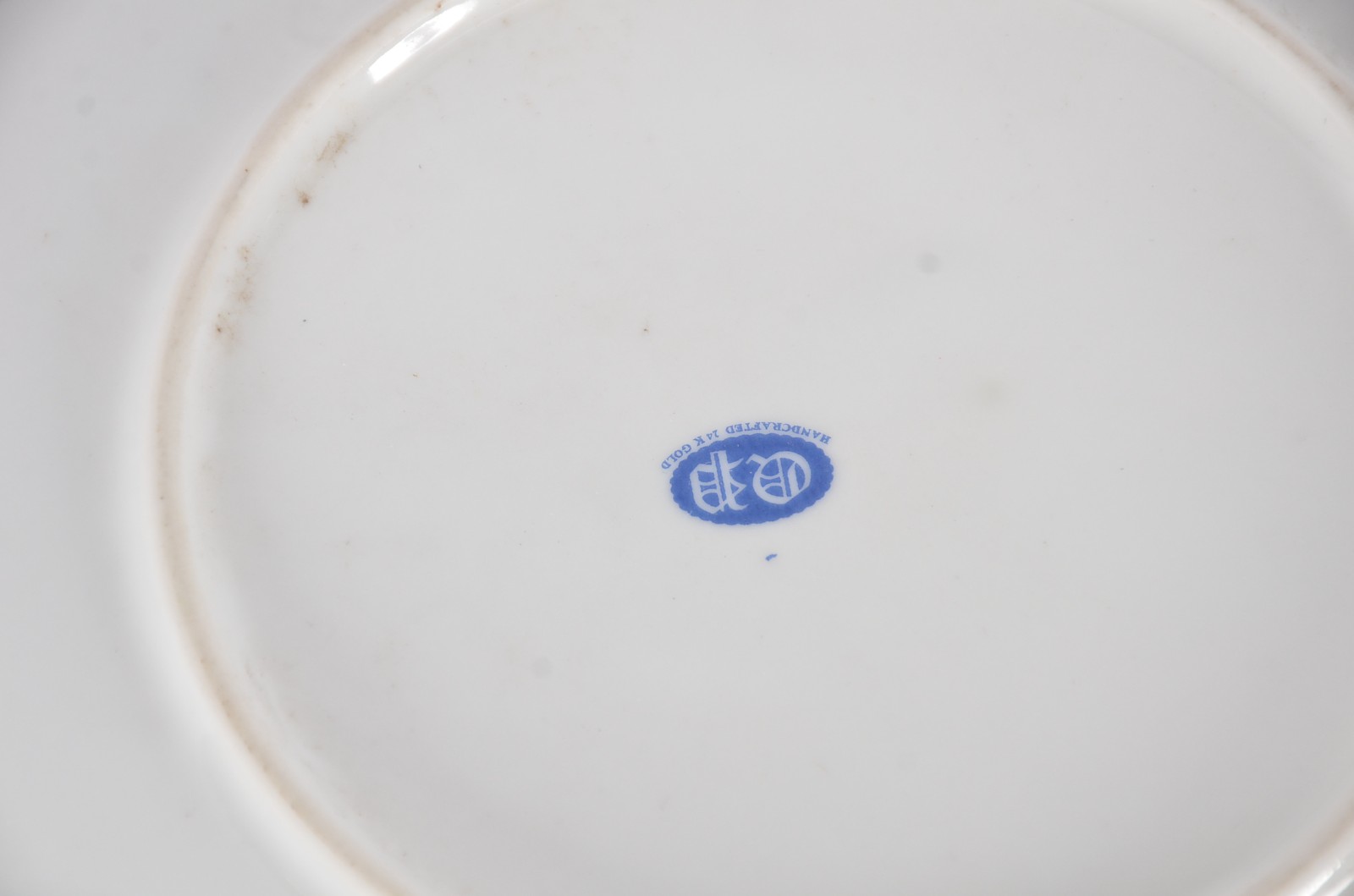 Treze pratos decorativos em porcelana de diversas procedências. - foto 4 de 11