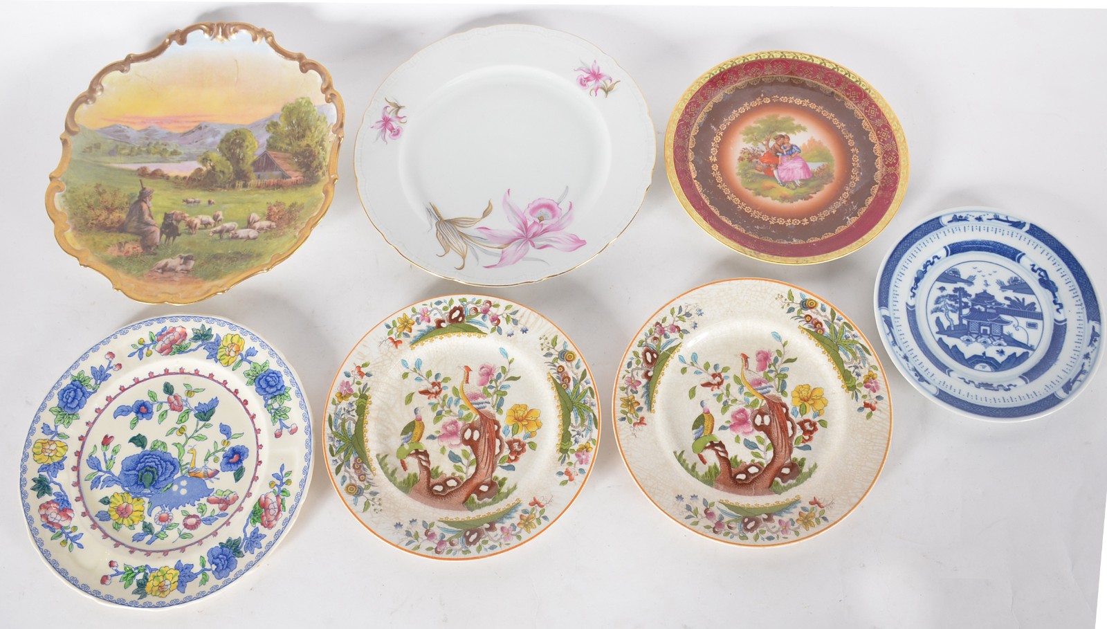 Treze pratos decorativos em porcelana de diversas procedências. - foto 7 de 11