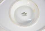 Serviço de jantar de porcelana Rosenthal borda ... - Serviço de jantar de porcelana Rosenthal borda bordeaux e guirlandas douradas composto de: 22 pratos rasos, 11 pratos de sobremesa e molheira.