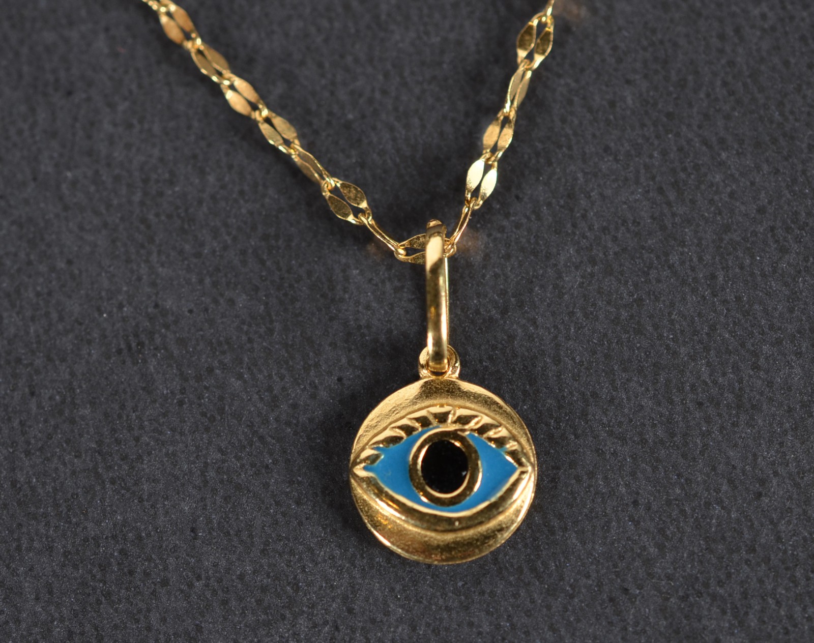 Colar de ouro 18k., contraste 750 com pingente de olho turco. (Por... - foto 1 de 6