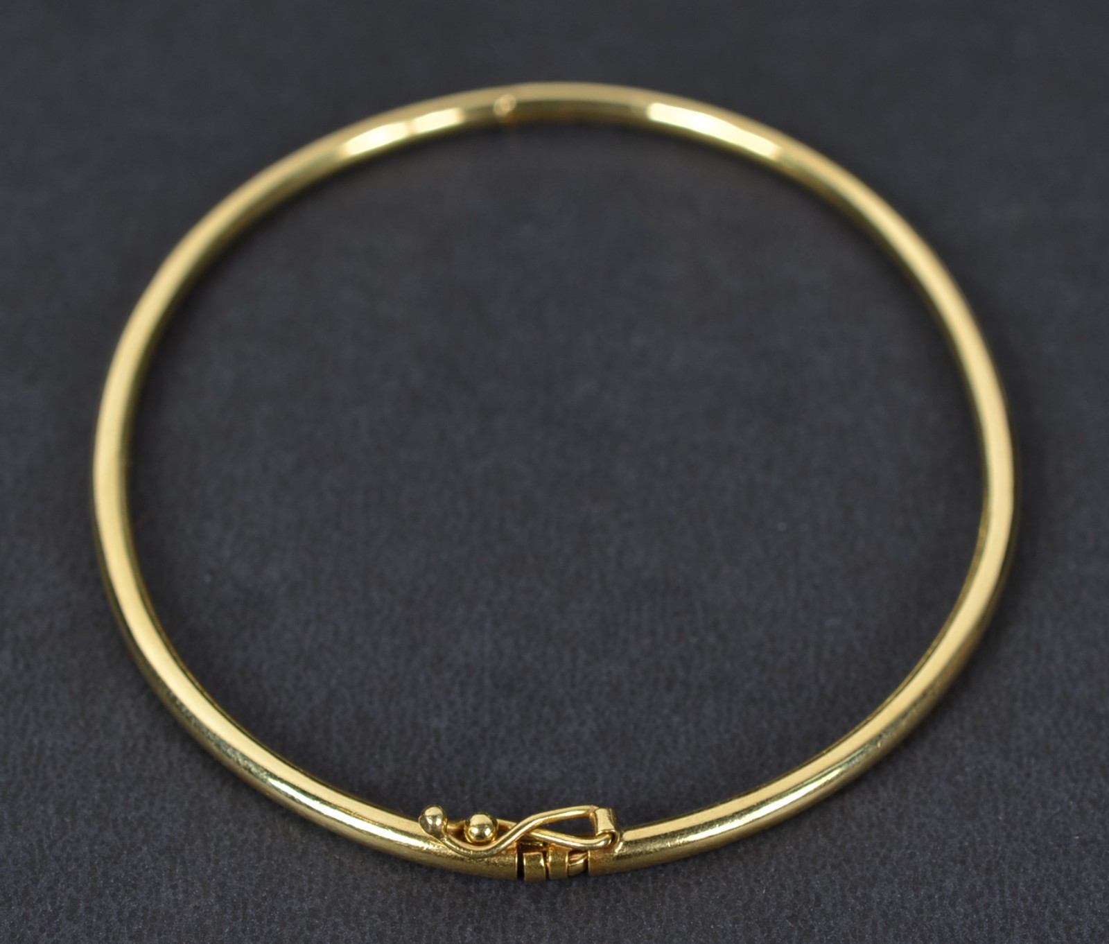 Pulseira de ouro 18k., contraste 750 modelo escrava. (Por motivos de... - foto 3 de 5