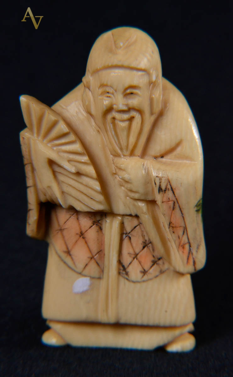 Netsuke de marfim repres figura com barba.