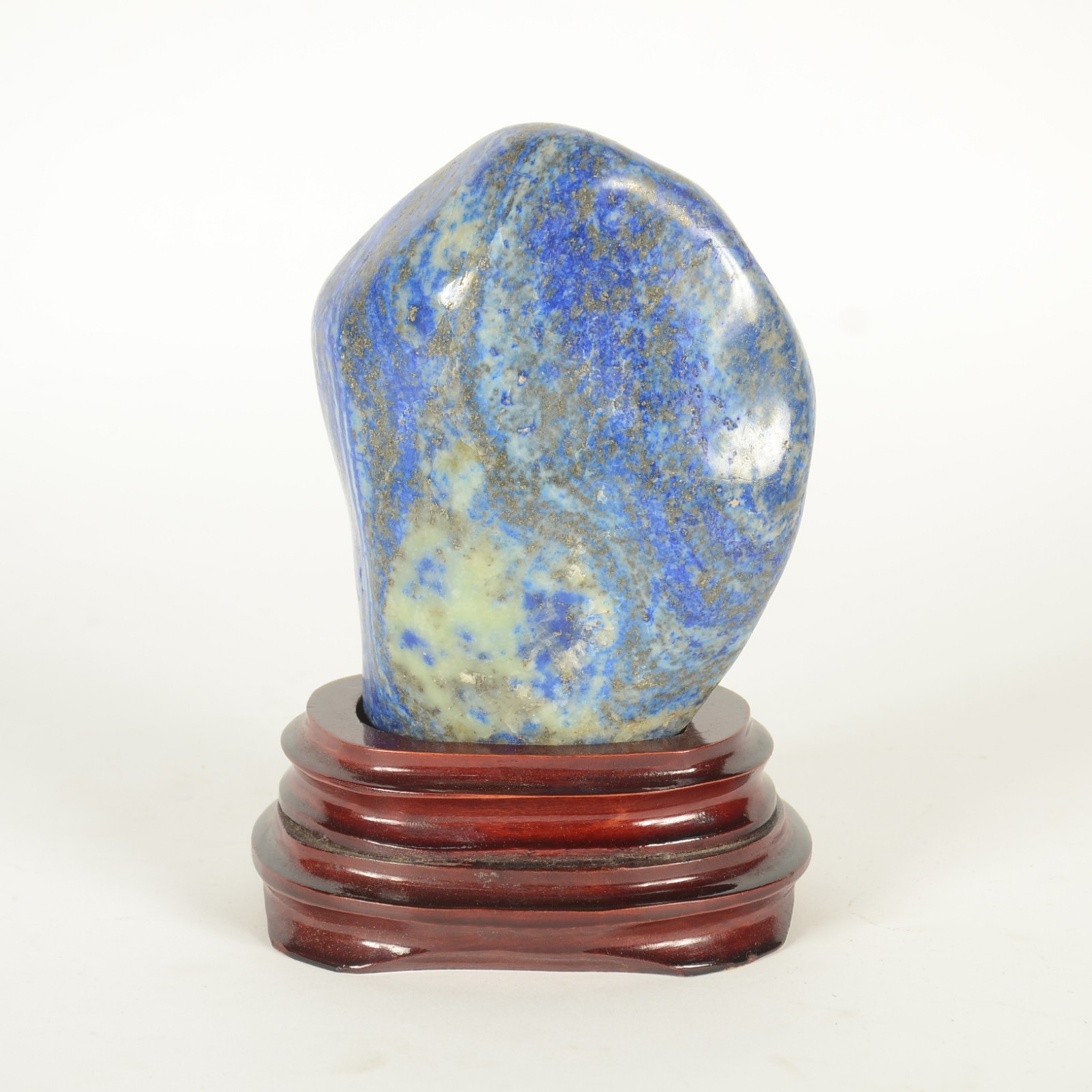 Escultura "abstrata" em pedra de lapislazuli, base de madeira. - foto 4 de 7