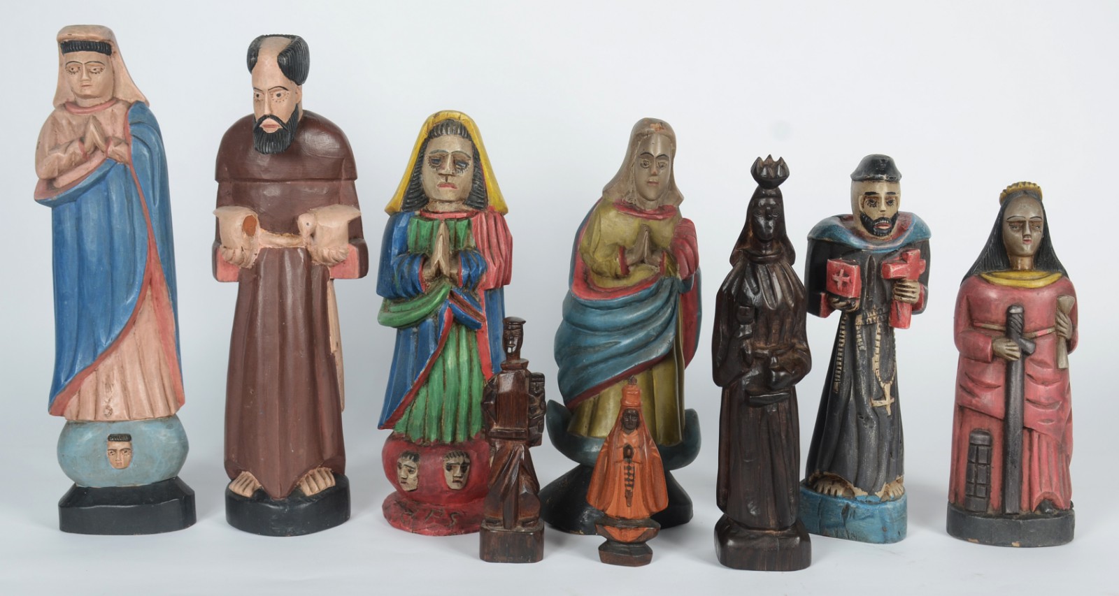 Arte Popular - Nove estatuetas entalhadas em madeira e policromadas... - foto 2 de 11