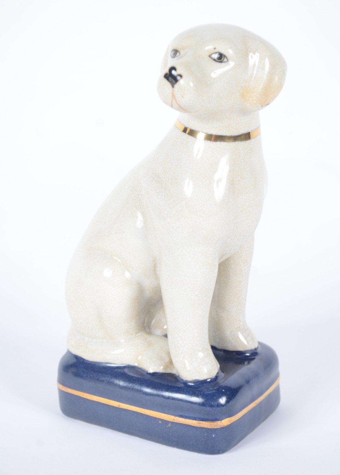 Estatueta de porcelana policromada representando cachorro, marca na... - foto 1 de 7