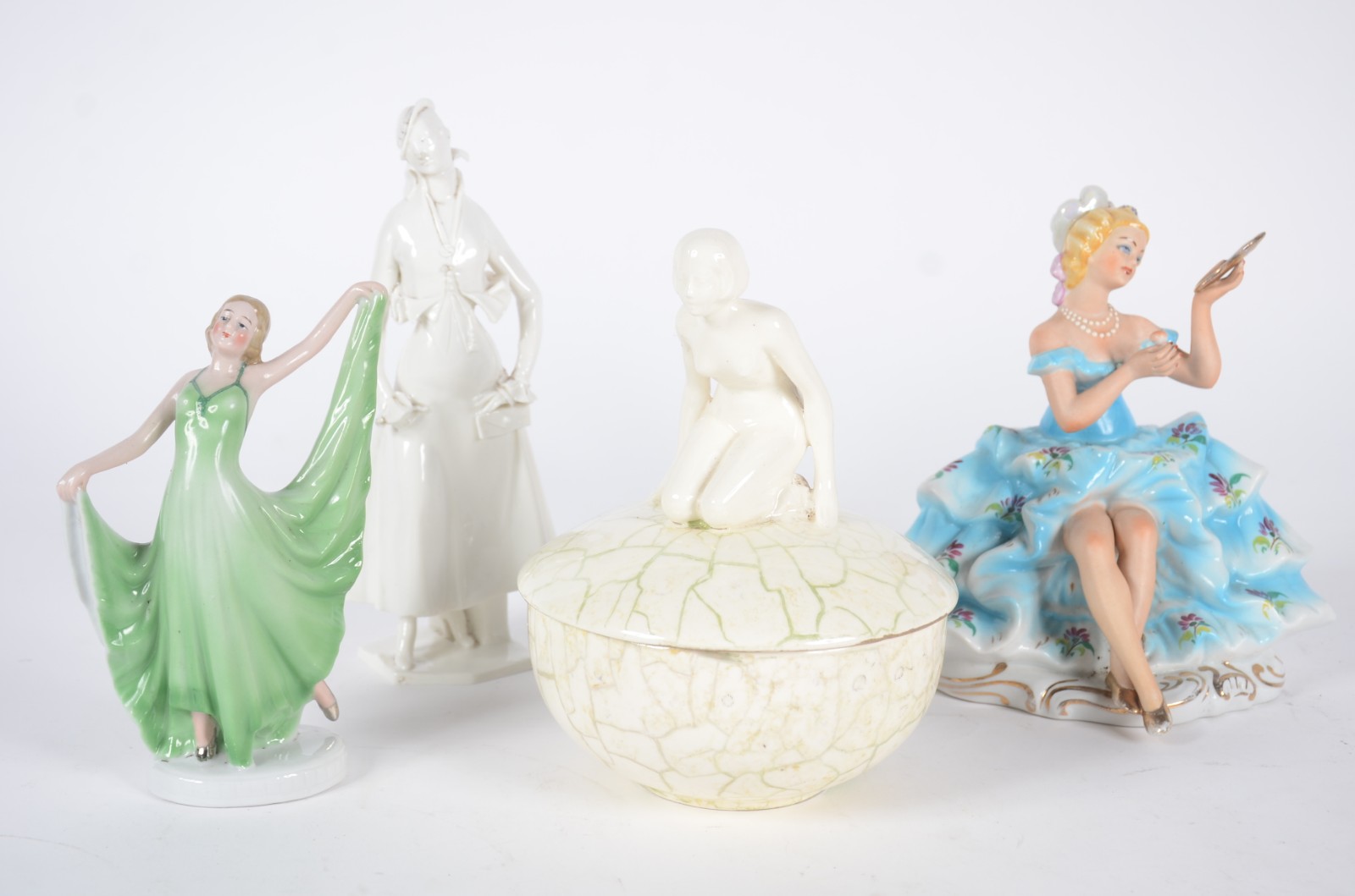 Quatro estatuetas de porcelana, diversas procedências, representando... - foto 1 de 11