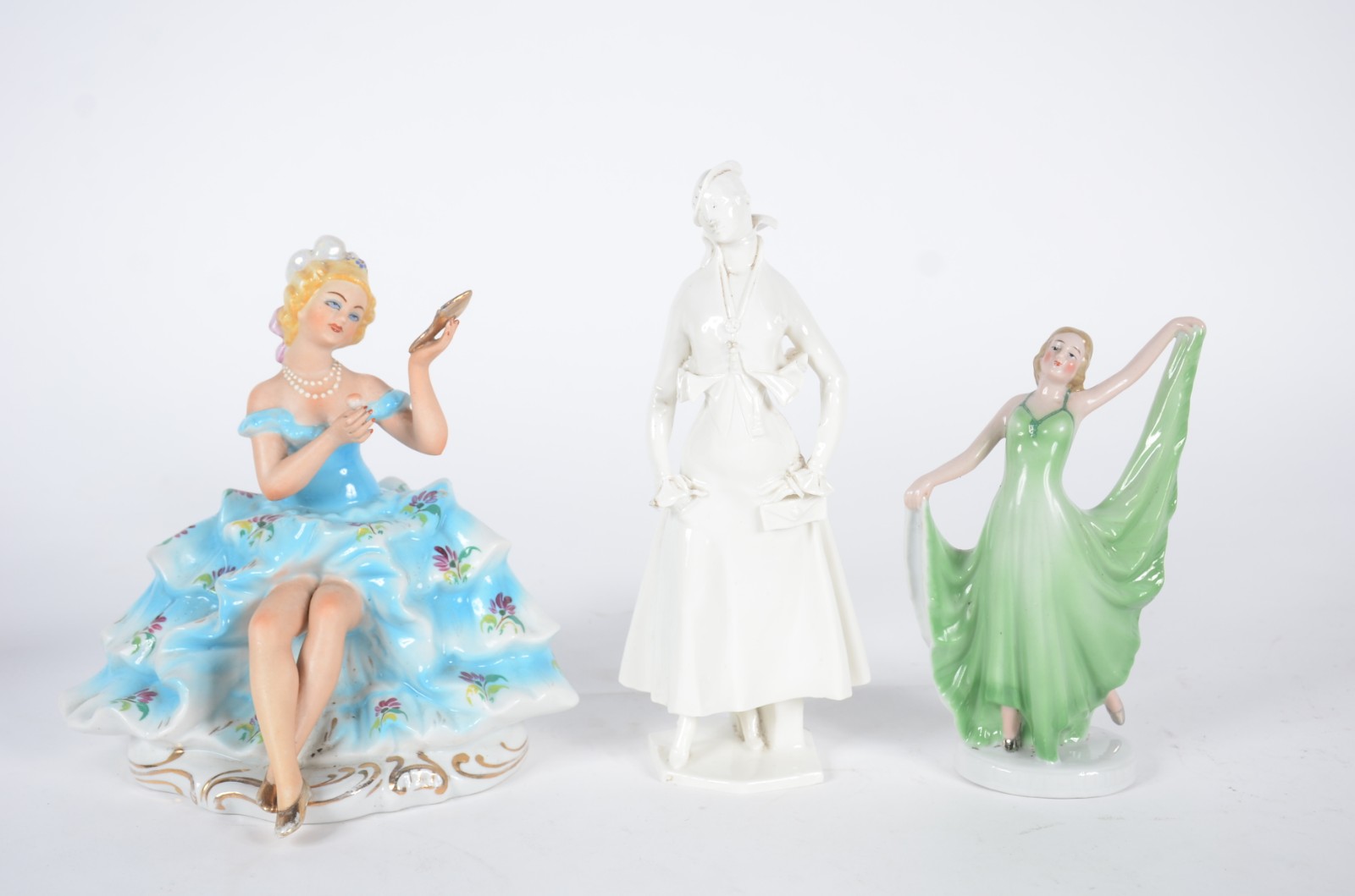 Quatro estatuetas de porcelana, diversas procedências, representando... - foto 3 de 11