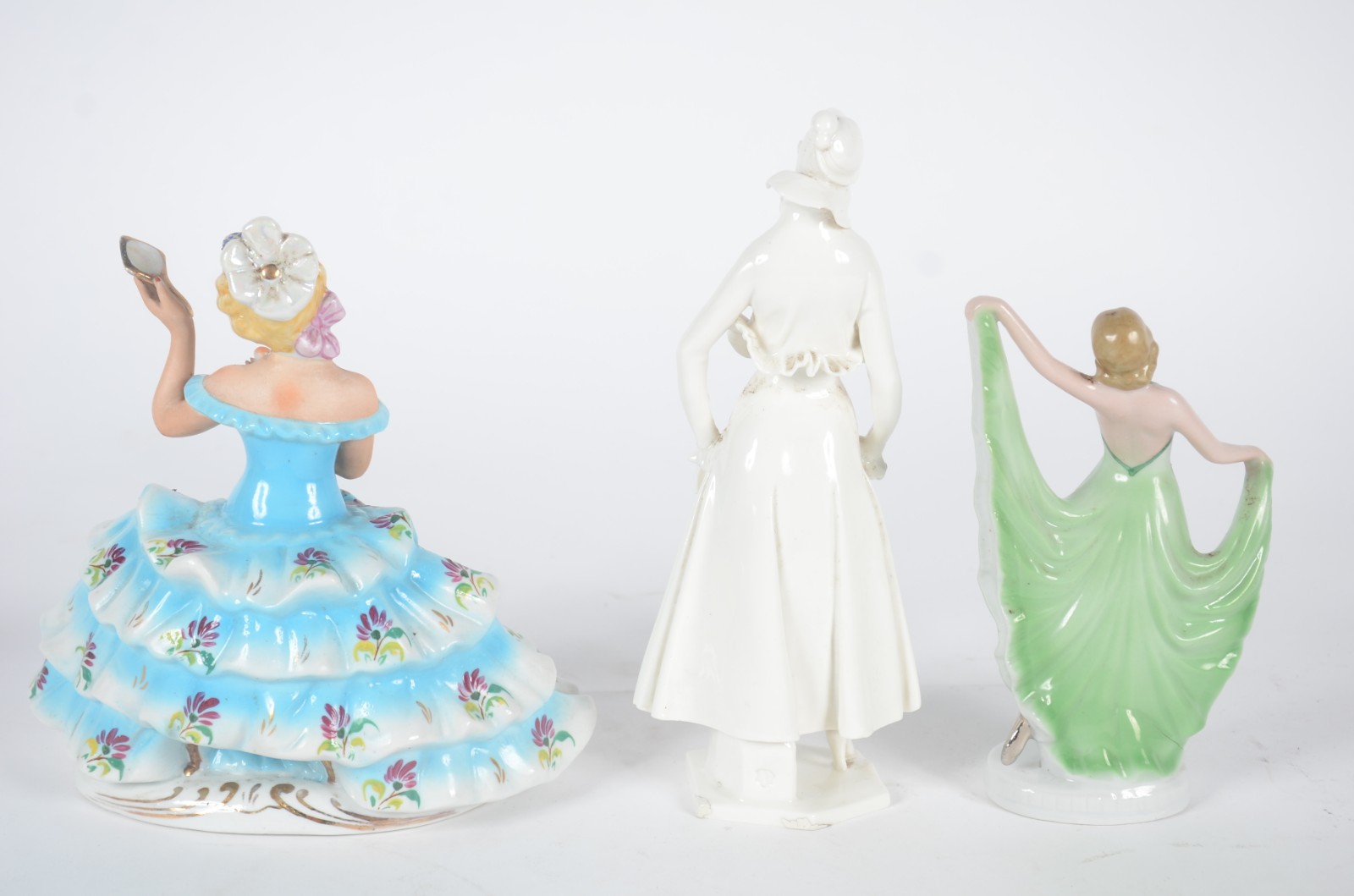 Quatro estatuetas de porcelana, diversas procedências, representando... - foto 8 de 11