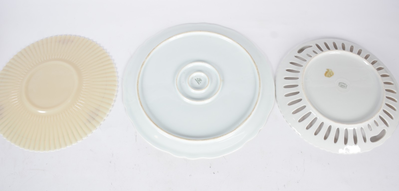Sete pratos de diversos materiais e procedências. - foto 4 de 11
