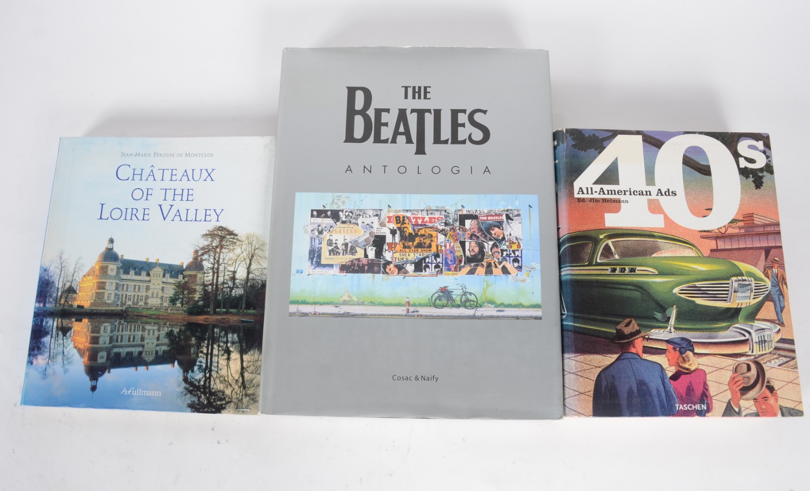 Três livros: A) All-American B) Châteaux Of The Loire Valley C) The... - foto 1 de 6