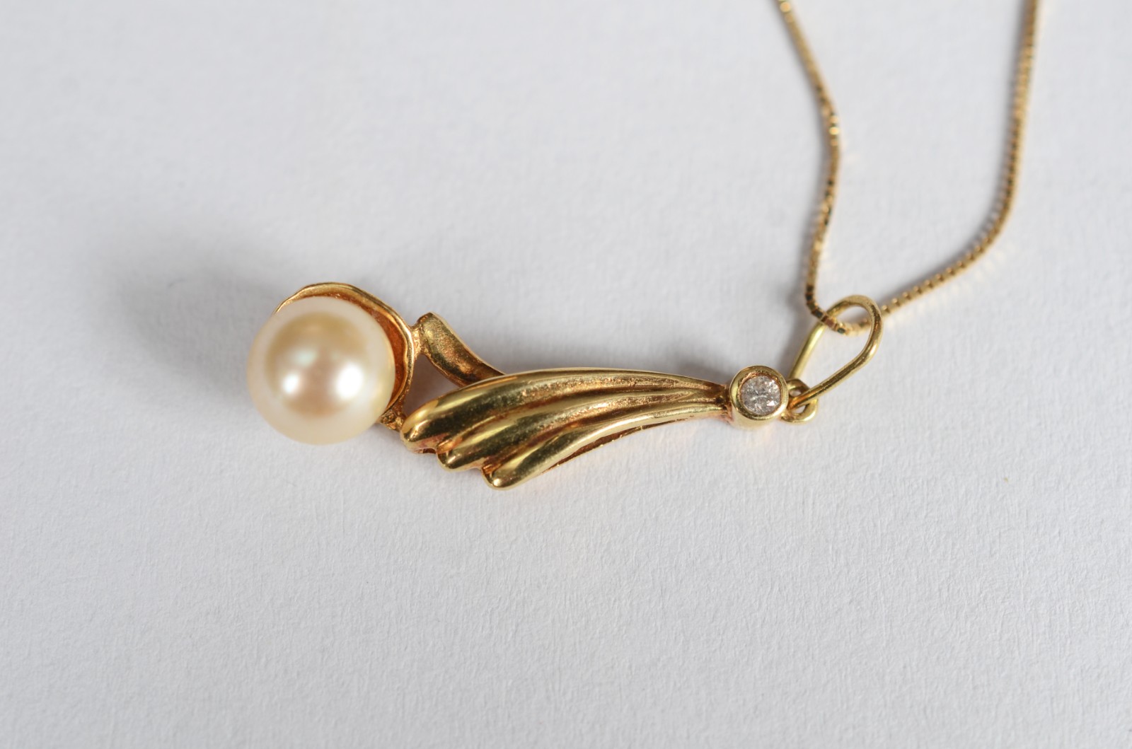 Colar de ouro 18 k, contraste 750 com pingente perola. (Por motivos... - foto 3 de 6
