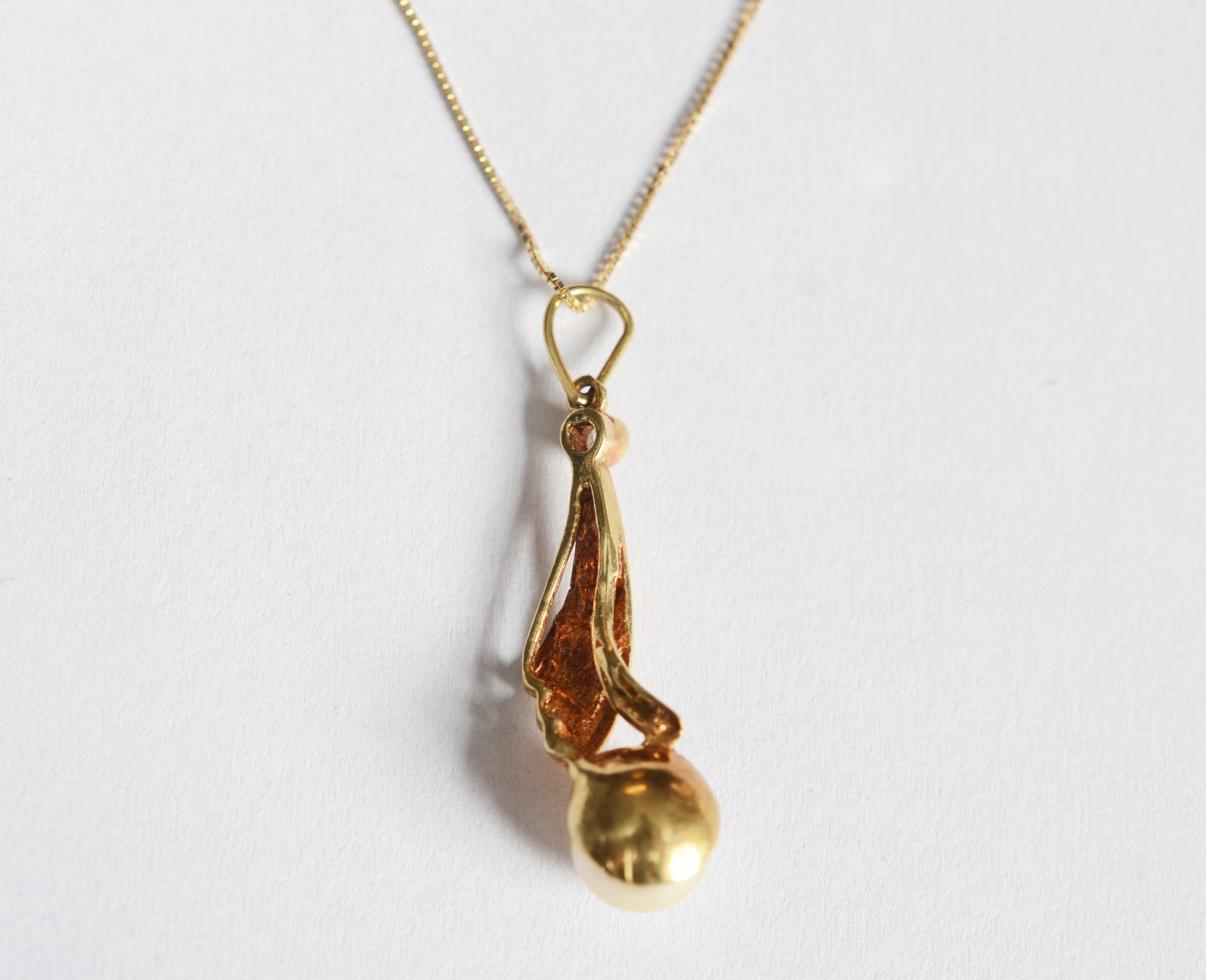 Colar de ouro 18 k, contraste 750 com pingente perola. (Por motivos... - foto 5 de 6