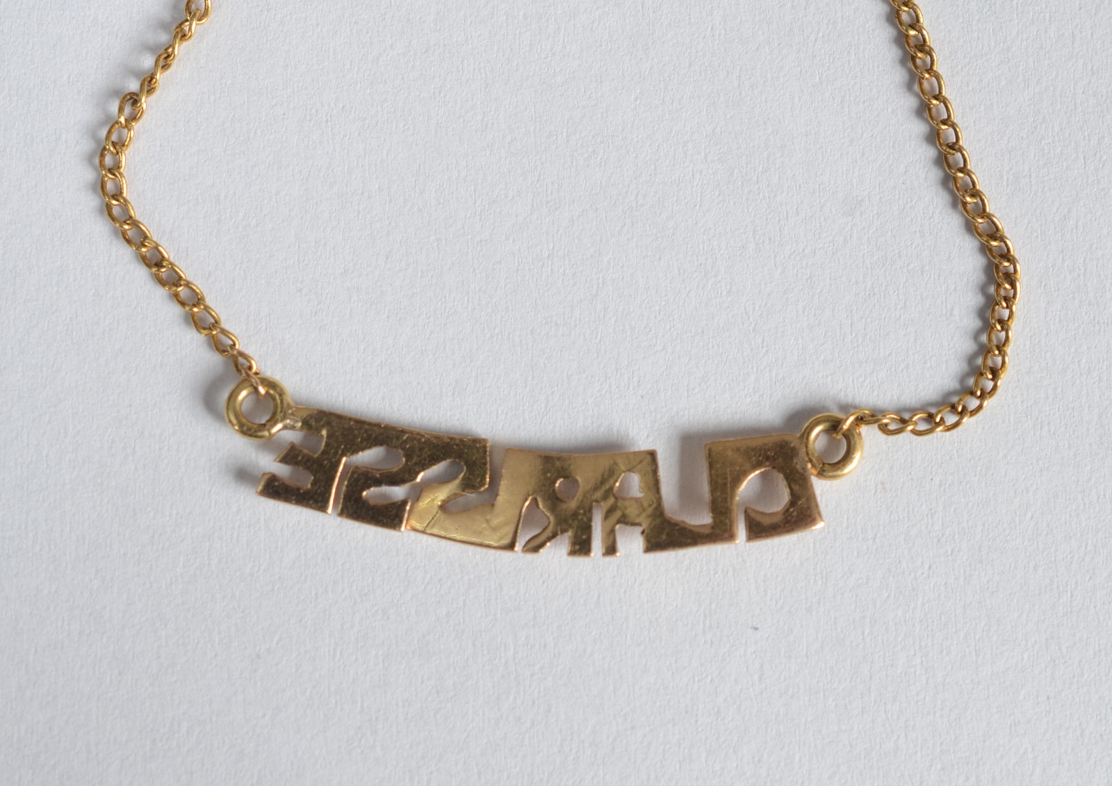 Cordão de ouro 18 k com pendente no nome "Clarisse". (Por motivos de... - foto 5 de 5
