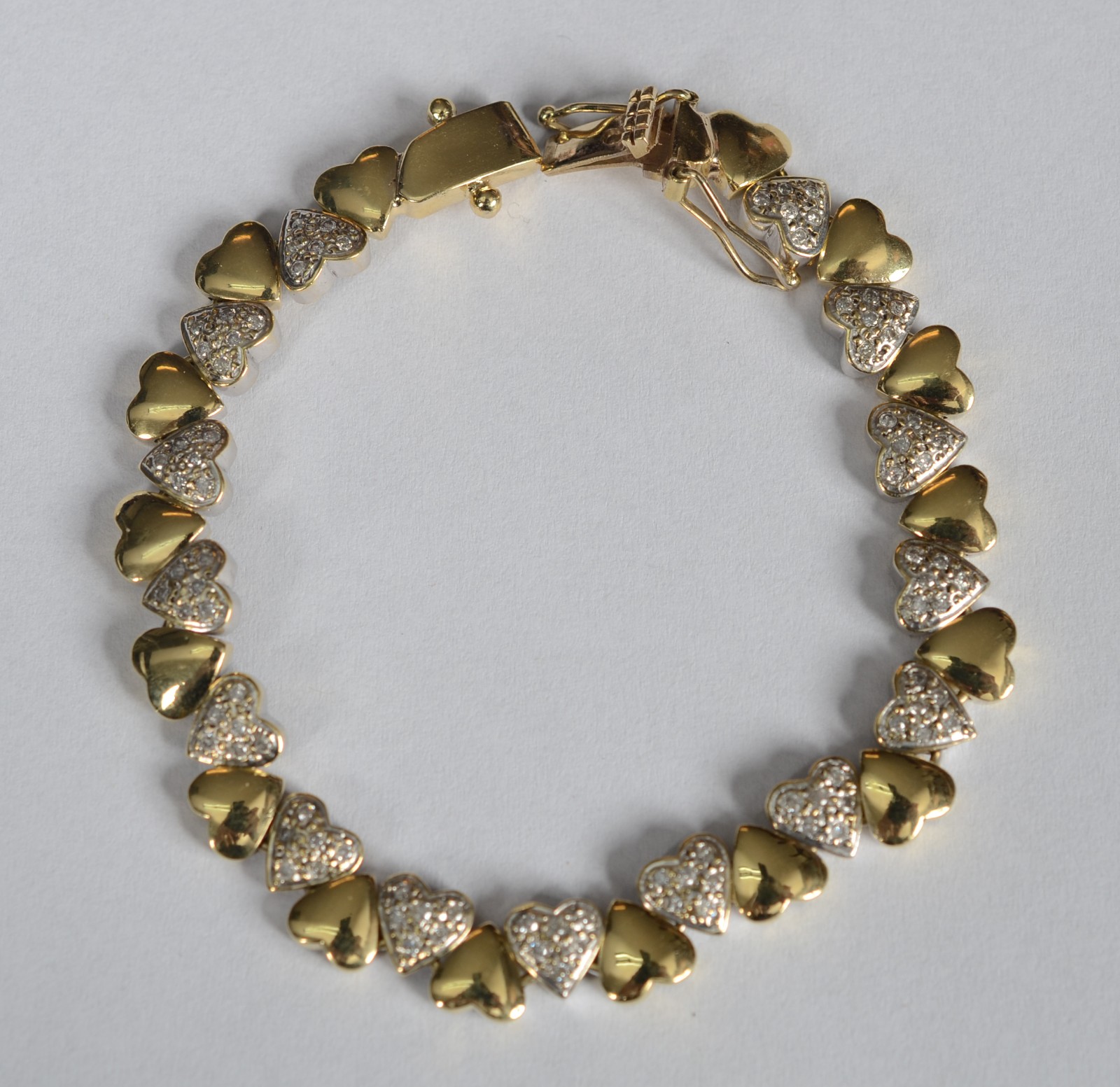 Pulseira de ouro 18 k e ouro branco, contraste 750 cravejado com... - foto 2 de 6