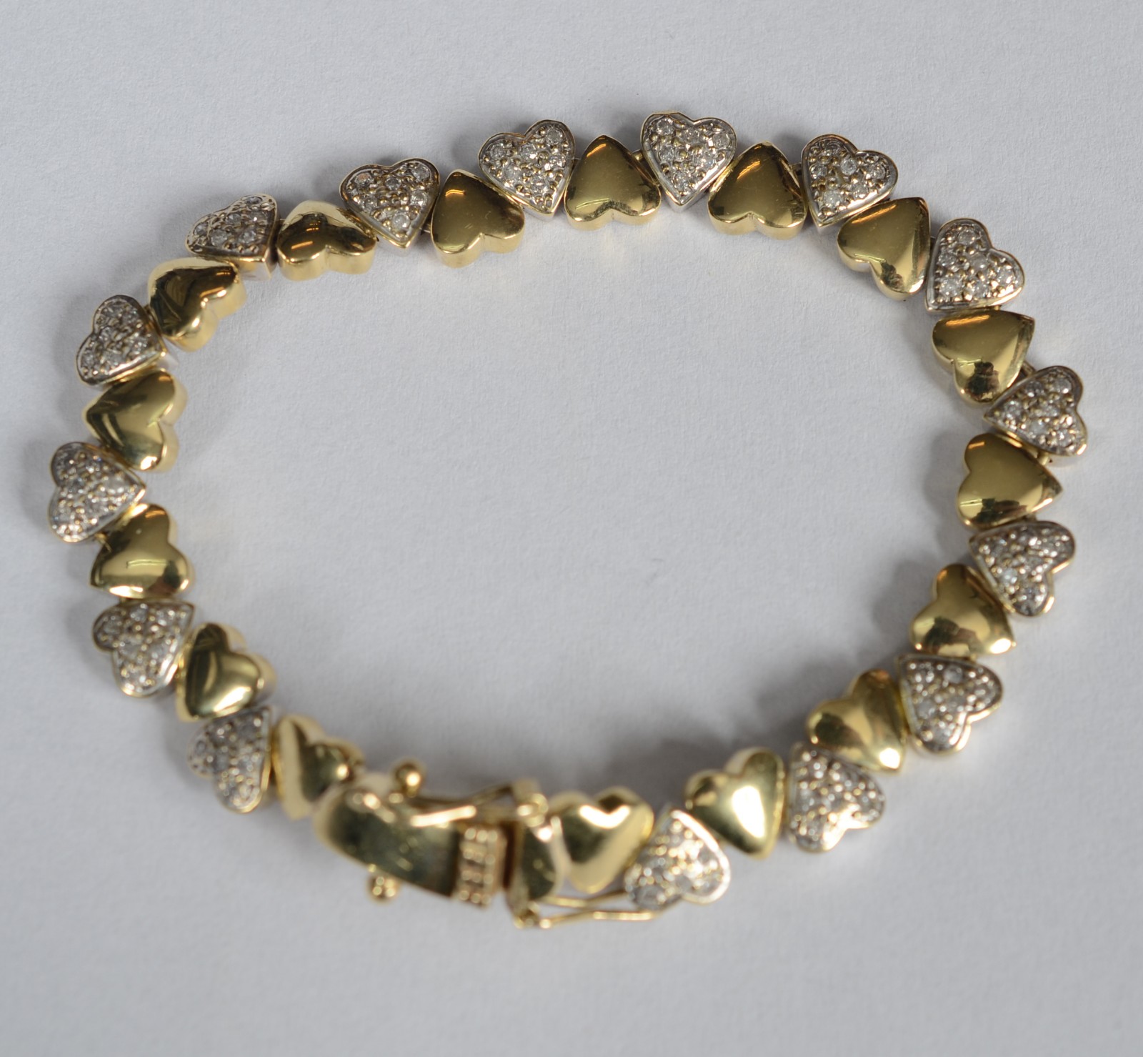 Pulseira de ouro 18 k e ouro branco, contraste 750 cravejado com... - foto 3 de 6