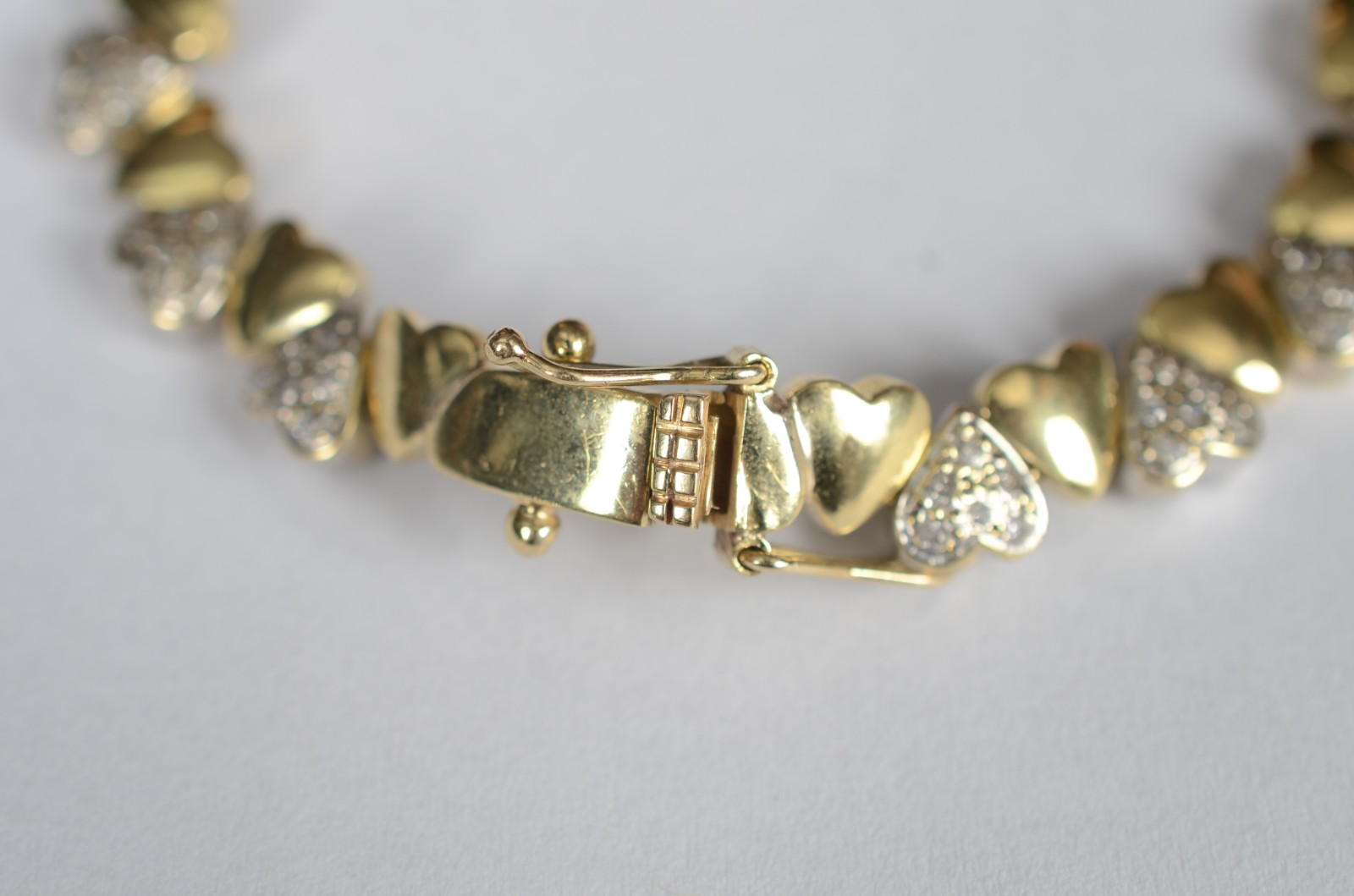 Pulseira de ouro 18 k e ouro branco, contraste 750 cravejado com... - foto 4 de 6