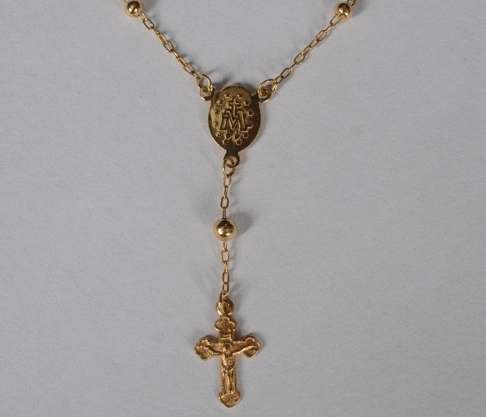 Colar de ouro 18 k feitio terço. (Por motivos de segurança a peça não... - foto 3 de 11