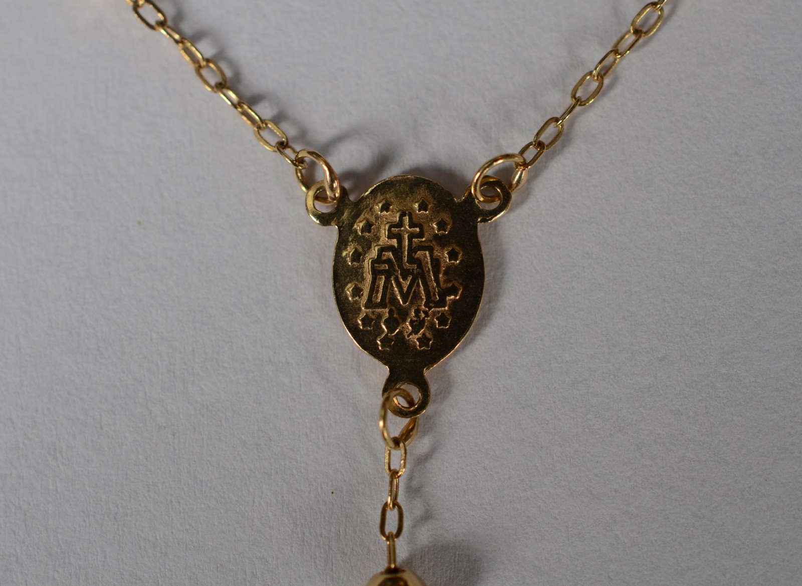Colar de ouro 18 k feitio terço. (Por motivos de segurança a peça não... - foto 4 de 11