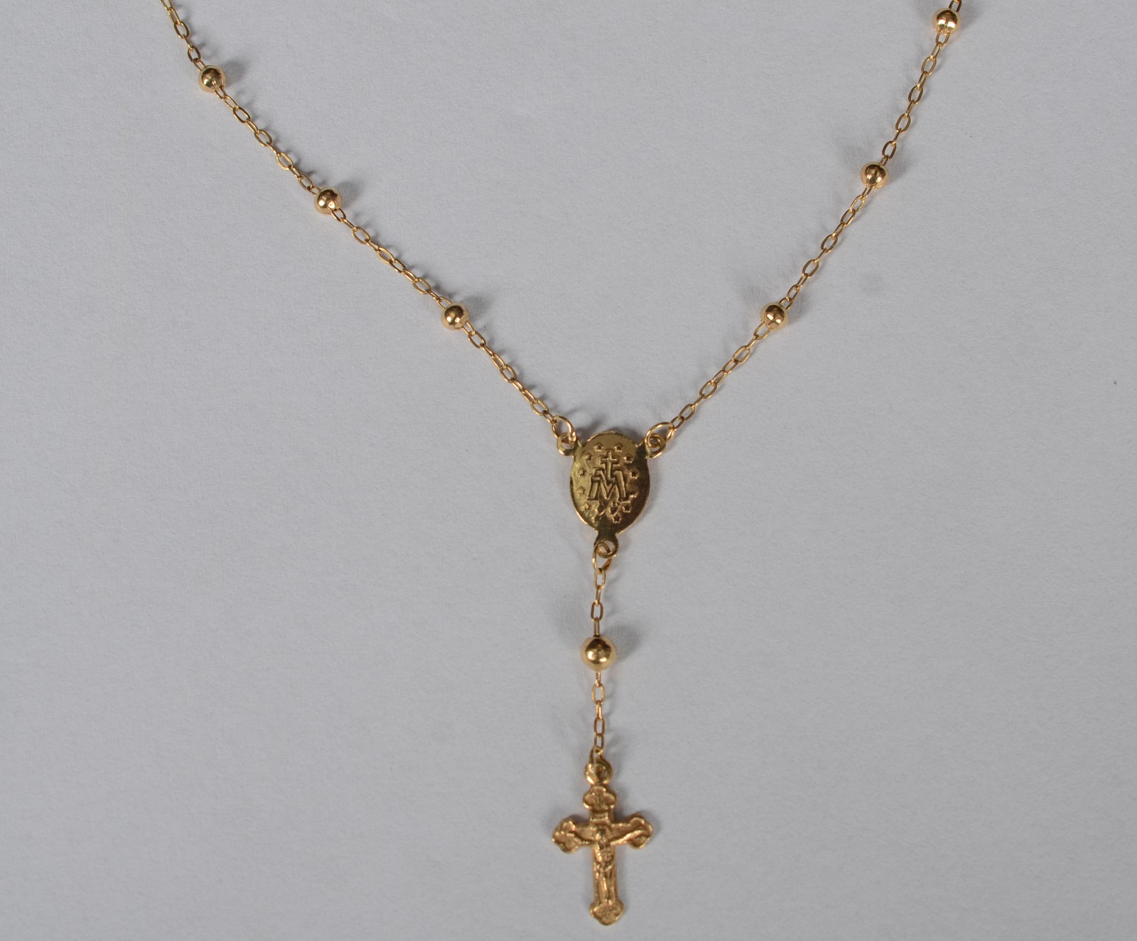 Colar de ouro 18 k feitio terço. (Por motivos de segurança a peça não... - foto 7 de 11