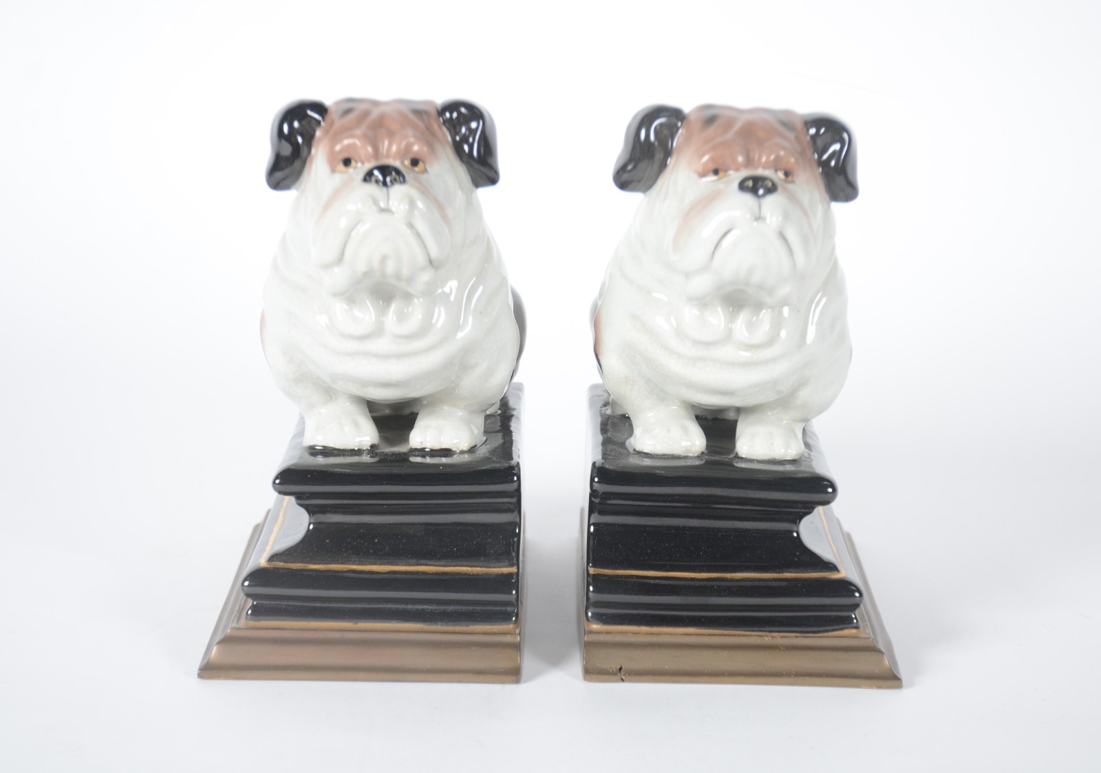 Par de serre livres na forma de cachorros em porcelana policromada. - foto 1 de 7