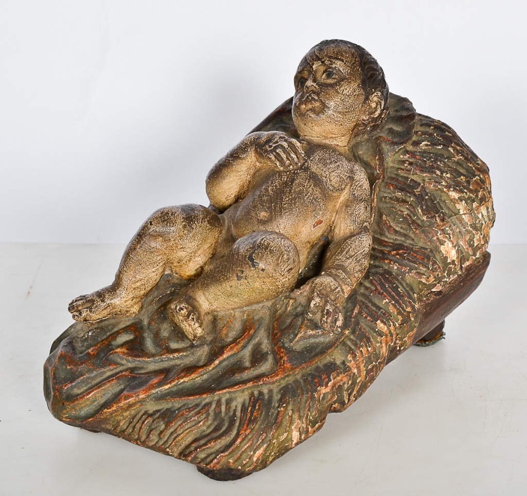 Imagem de madeira repres.Menino Jesus med. 32 x 18 alt. 22 cm.