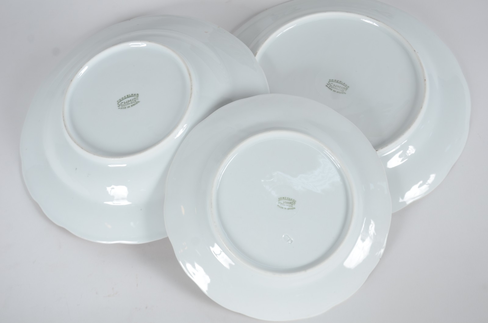 Aparelho de jantar, chá e café de porcelana Schmidt, borda vinho com... - foto 10 de 11